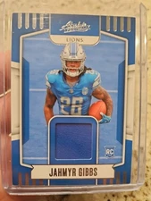 2023 Panini Absolute - Absolute Rookie Materials Jahmyr Gibbs #ARM-6 (MEM, RC)