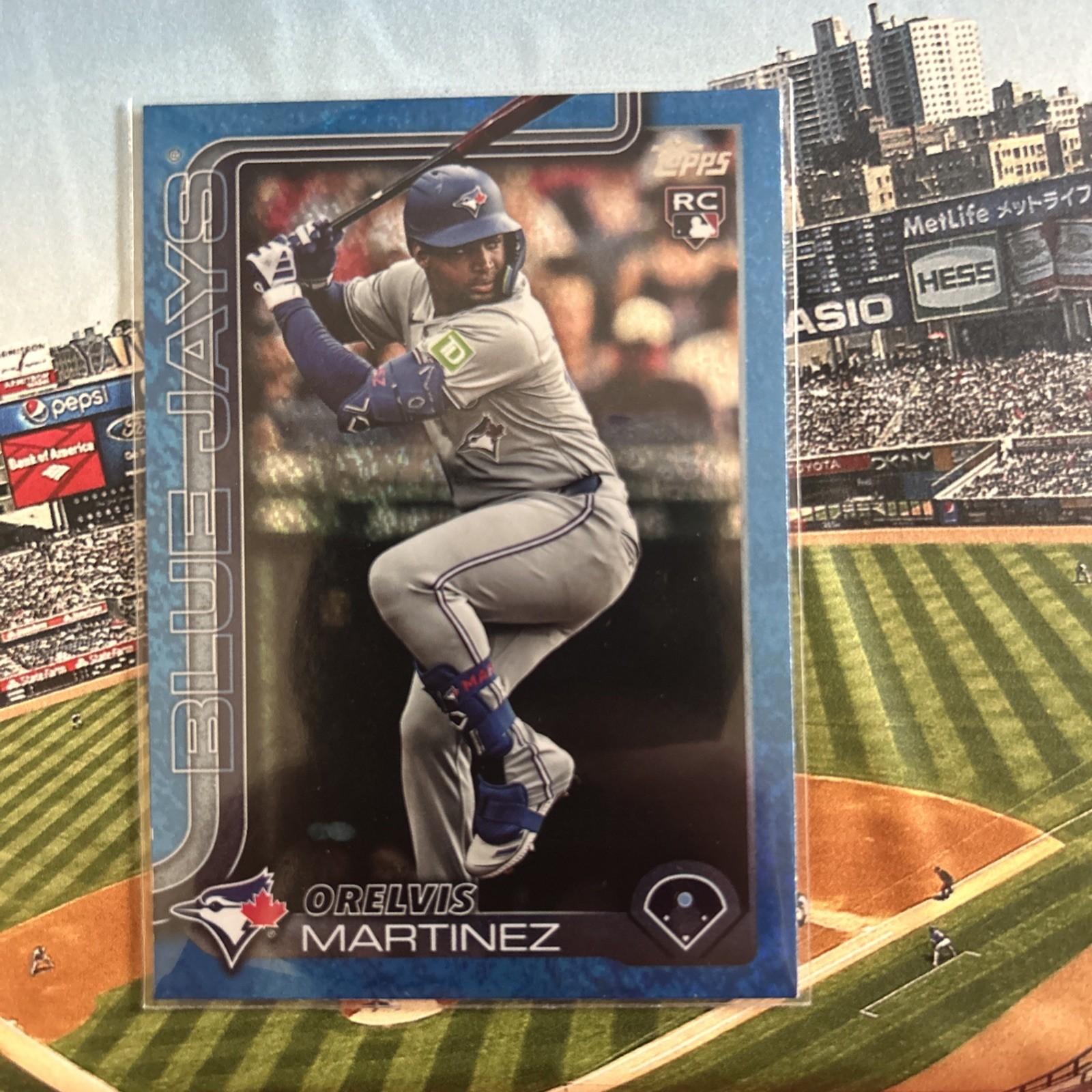 2025 Topps #18 Orelvis Martinez Blue Foil Parallel Rookie Card 012/150 Toronto
