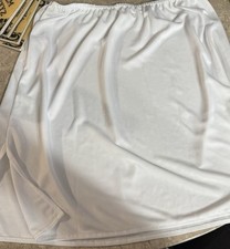 VINTAGE VASSARETTE HALF SLIP .  SIZE SMALL.  WHITE.  16 INCH