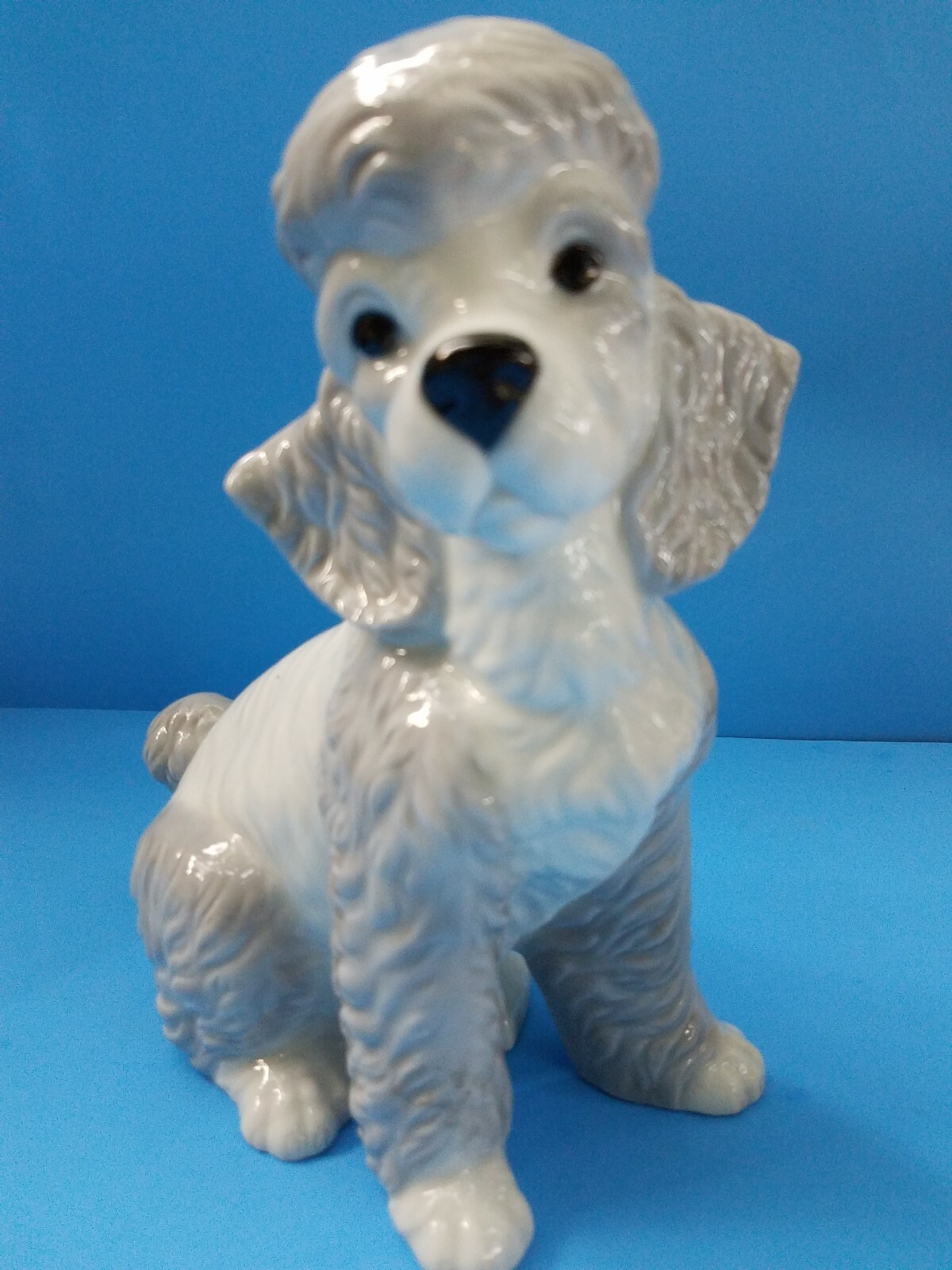 Discover the Elegant DNC Porcelain Poodle Collectible