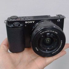 Sony ZV-E10 ZVE10 24.2MP Mirrorless Camera w/16-50mm Lens English -95 New