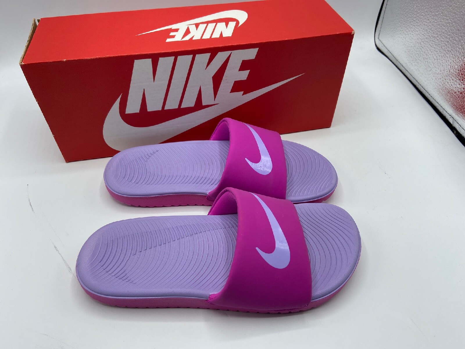 nike slides 7y
