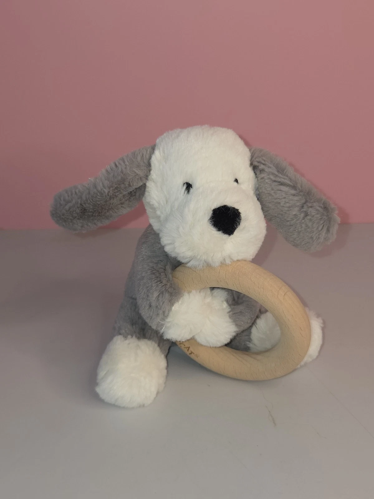 Jellycat Shooshu Puppy Dog Plush Rattle Wooden Teething Ring Stuffed Animal Toy
Opens in a new windo