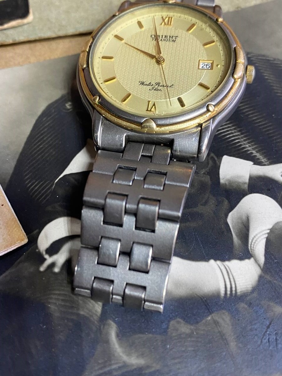 Vintage Men's Orient Watch Titanium Case Quartz KY HT7043-70 CS
