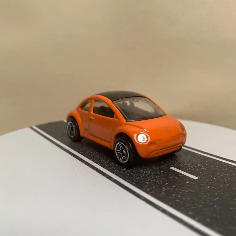 Volkswagen VW Concept 1997 Matchbox 1 Beetle Bug naranja con división de 5 radios 1:64 casi nuevo Foto 3 de 4