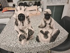2 Red Indian Figures