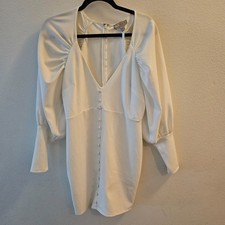 ASOS White puff sleeve mini dress with a deep V-neckline and button details US8