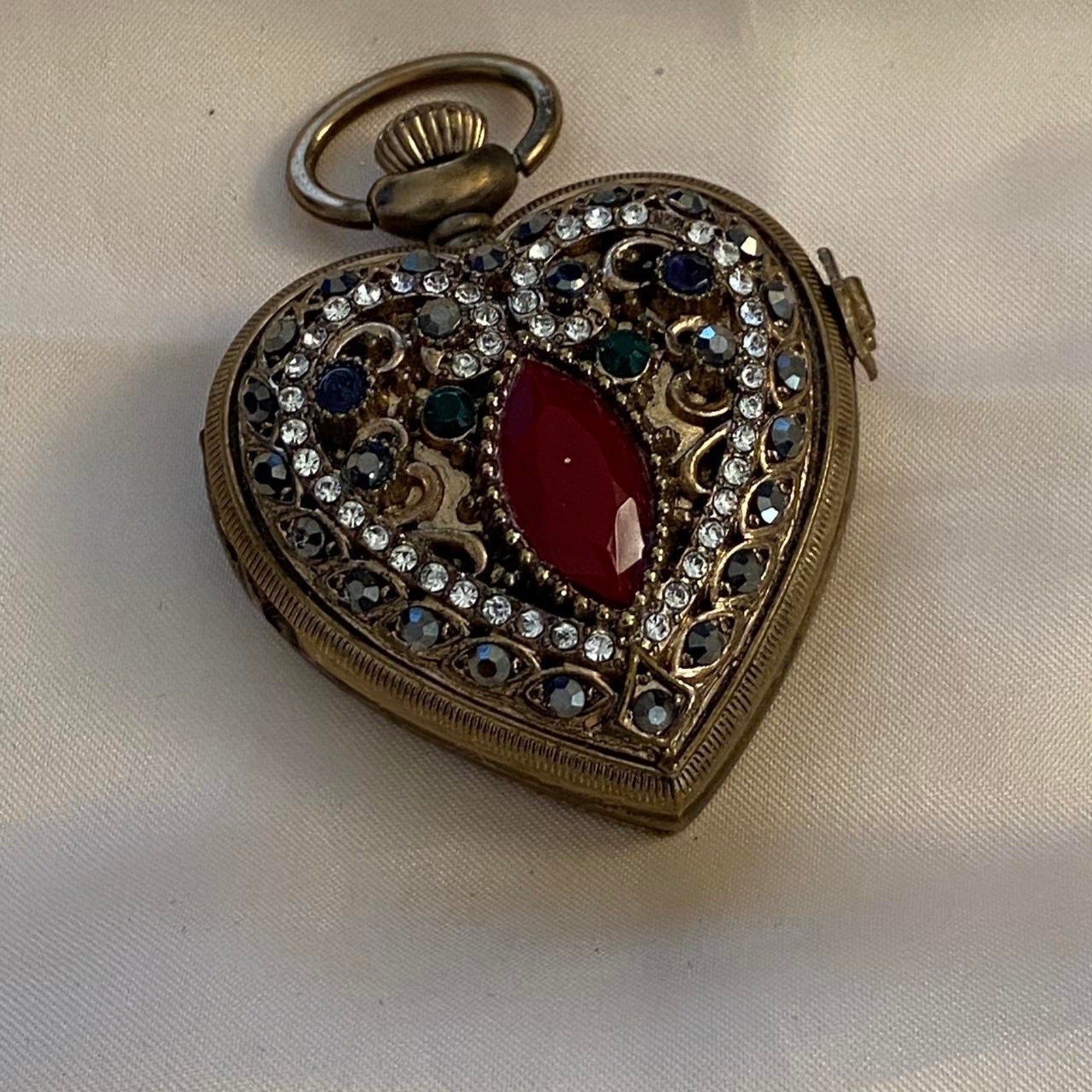 Vintage Sarah Coventry heart-shaped watch pendant 