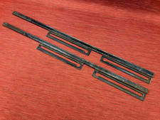 NOS pair of 1933-1934 Ford Tudor sedan bottom window channel brackets, Flathead