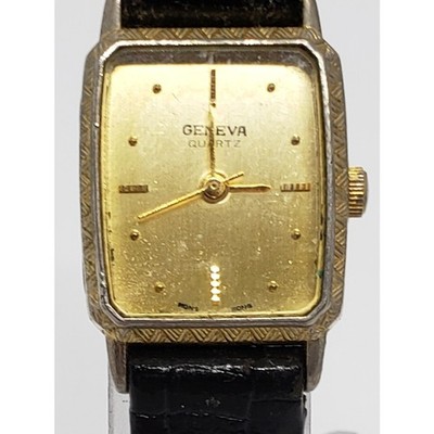 Geneva Women's watch. Gold face with gold accents. Black adjustable band