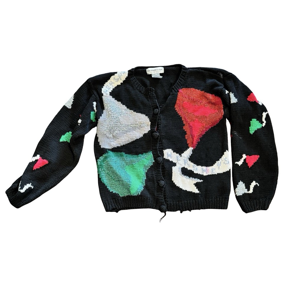 A genuine 90s Hershey's Kisses novelty cardigan — the kind of irresistibly kitschy statement piece people fight over at thrift stores.