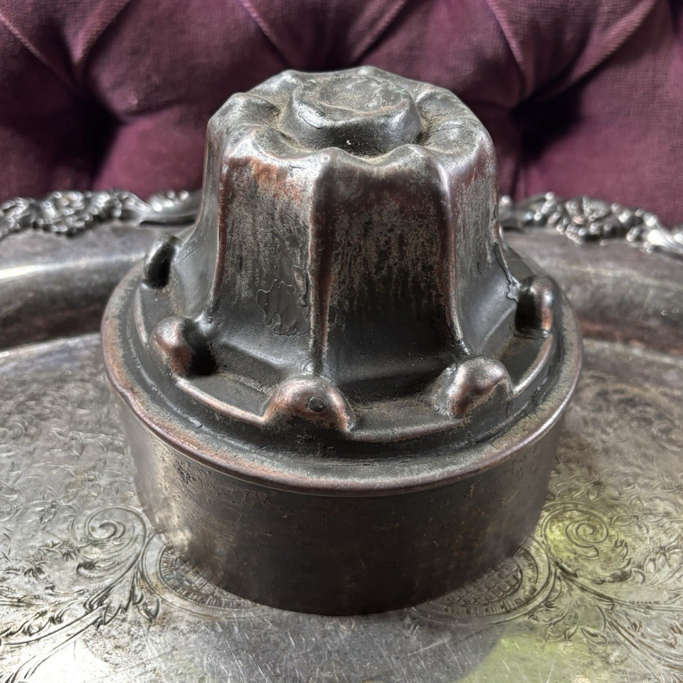 A genuine Victorian copper-tin octagon jelly mold — the kind of oddity that looks equally at home in a curiosity cabinet, a moody kitchen, or an art installation.