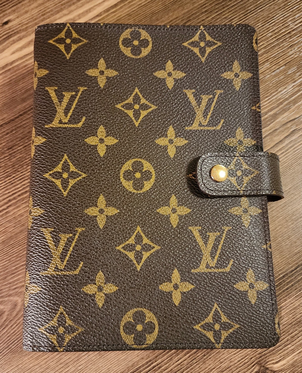 Vintage watch case with monogram pattern by Louis Vuitton, France