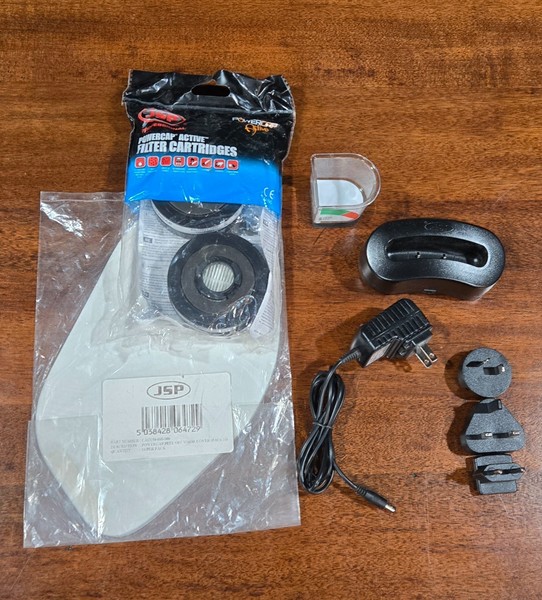 Accesorios JSP Powercap. Filtros, cubiertas de visera, cargador, base