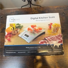 Mainstays Glass Digital Kitchen Scale with a 5000g/11 lb capacity.