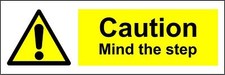 Caution mind the step safety sign