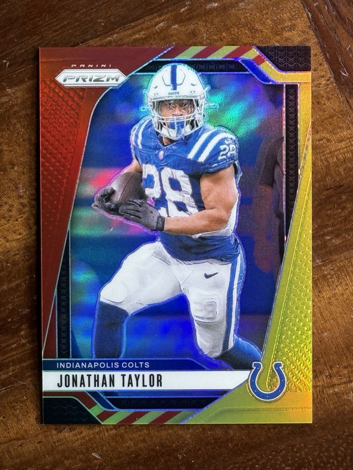 2024 Prizm Jonathan Taylor #121 Red and Yellow /44 INDIANAPOLIS COLTS