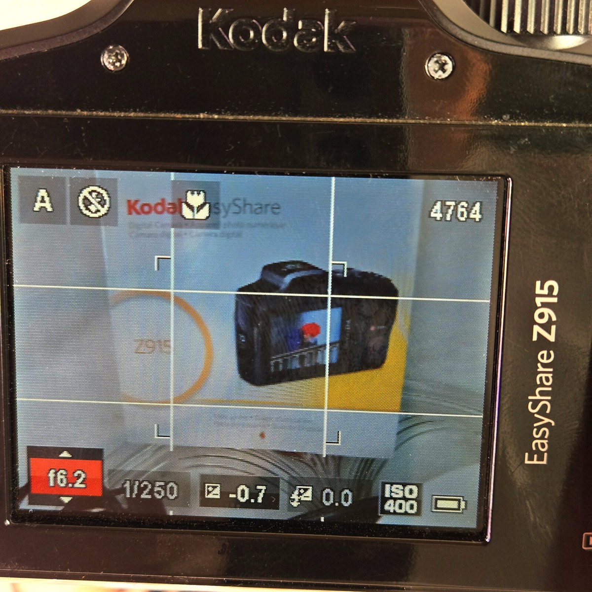 Kodak Z915 10MP 10X Zoom. Also, Makes Videos and Slow Motion. Same