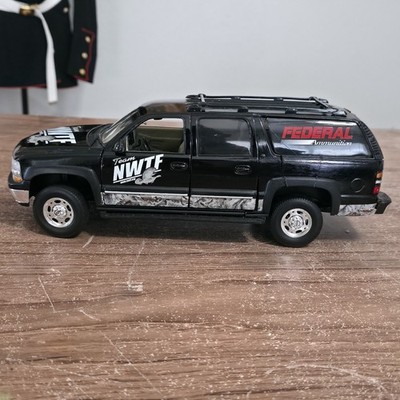 1/18  2002 CHEVROLET SUBURBAN BY ERTL,''NWTF TEAM FEDERAL AMMO'',BLACK - Read Des