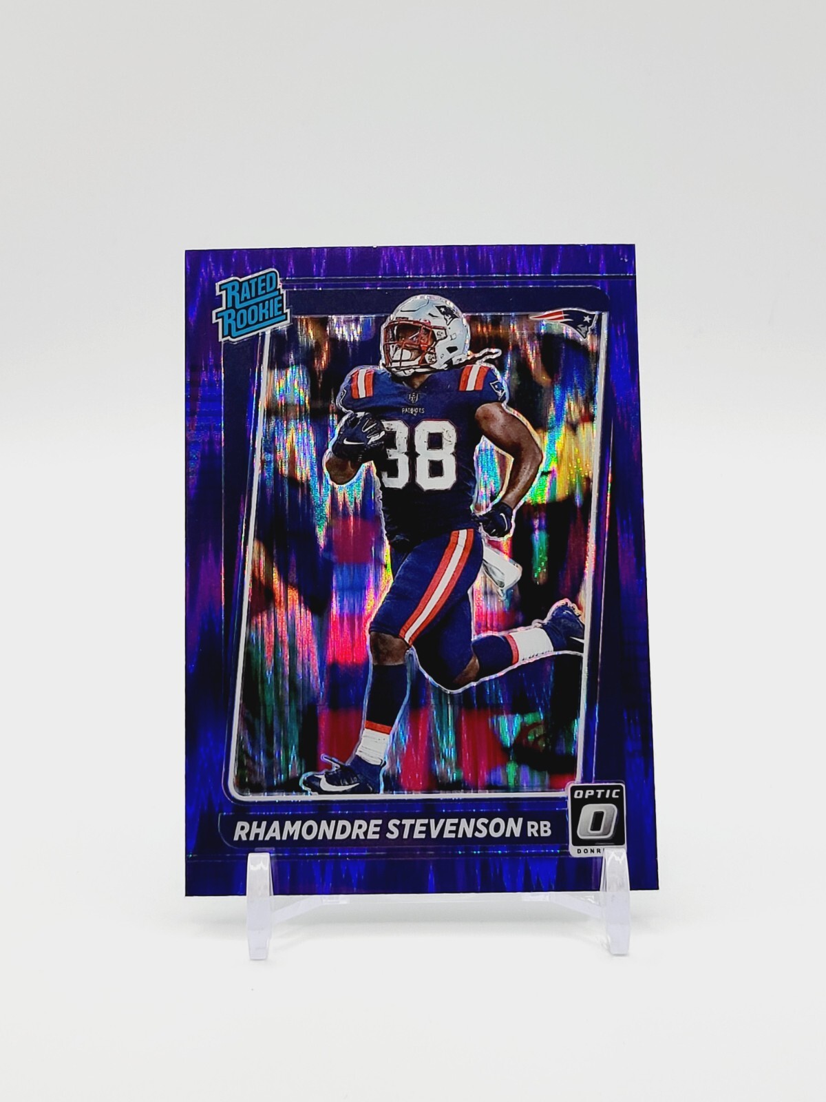 Rhamondre Stevenson RATED ROOKIE Purple Shock PRIZM 2021 Donruss Optic #237 (RC)