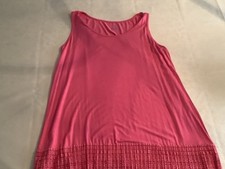 Lot Of Women’s Clothing, 7 Items, a mix of medium and large. 