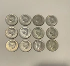 12 Kennedy half dollars, 40 percent silver, lot of 12 coins, $6 face value.