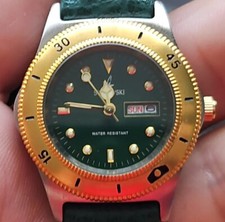 Genuine Women’s VINTAGE SWAROVSKI OPTIK WRISTWATCH W/GREEN BAND 