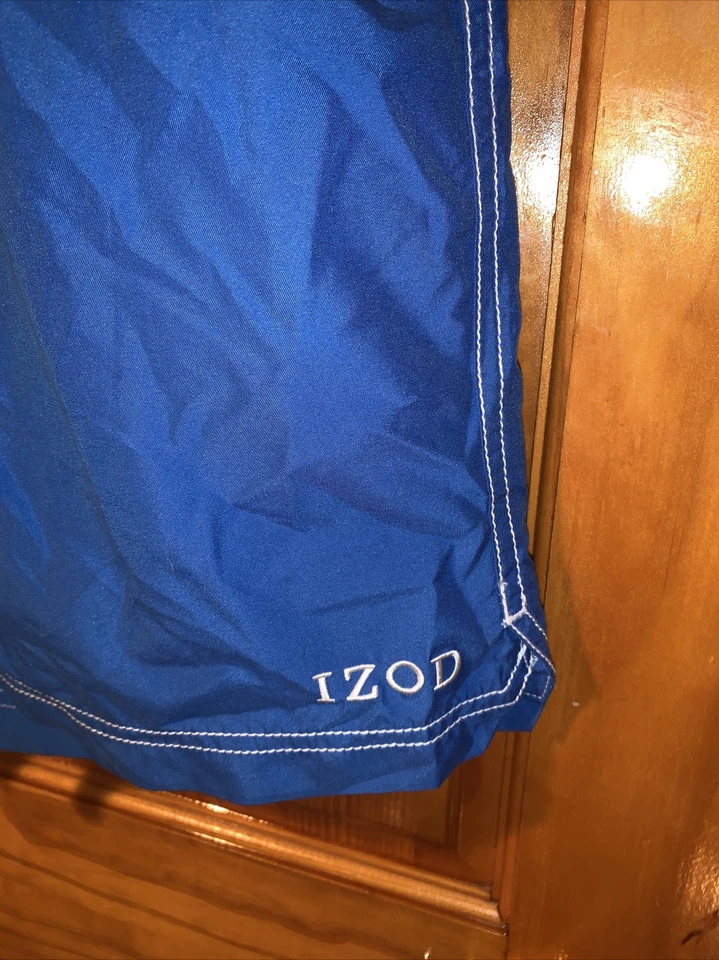Pantalones cortos de natación IZOD para hombre azules con detalles rojos blancos talla XL retro Foto 2 de 4