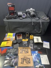 Nikon FG 35mm SLR Film Camera W/ Serie E 50mm 1:1.8 Lens  Xtras