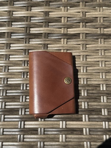 Haptic shell cordovan wallet