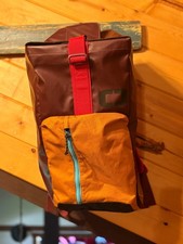 OGIO Burgundy backpack duffel with orange pocket and blue zippers