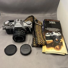 Canon AE-1 35mm SLR Film Camera with 50mm Lens Manuals Works Great Boho Strap