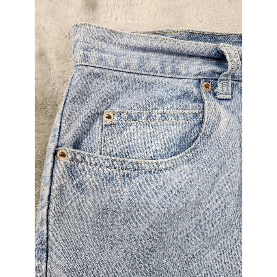 Falda midi vintage años 90 Bill Blass Jeans tiro alto dobladillo crudo abertura talla 32 azul  Foto 2 de 4