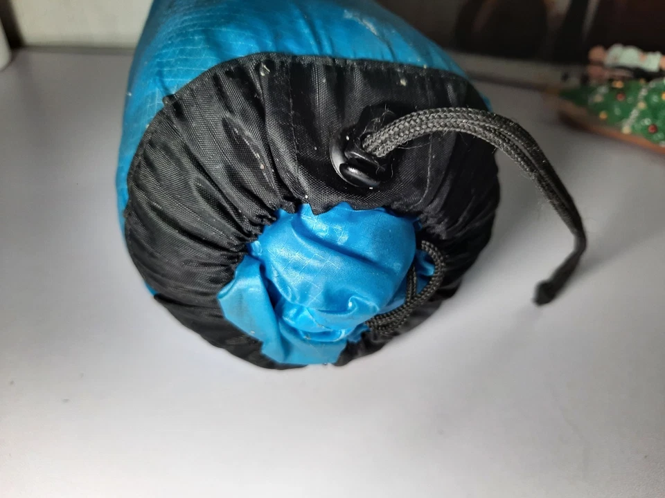 Poncho de lona Sea To Summit Ultra-Sil Nano 15D 57”x104” 8,1 oz azul Foto 3 de 4