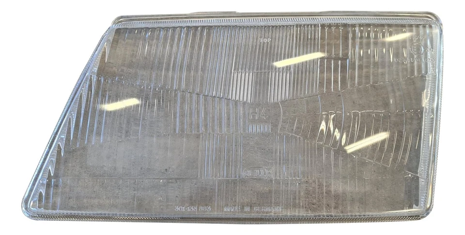 Verre de phare gauche Hella type origine pour Saab 9000 de 1988 à 1992 - Photo 1/1