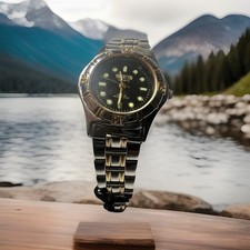 manhattan by croton watch, ladies, water resistant,two Tone,27mm Case,Super/Lum