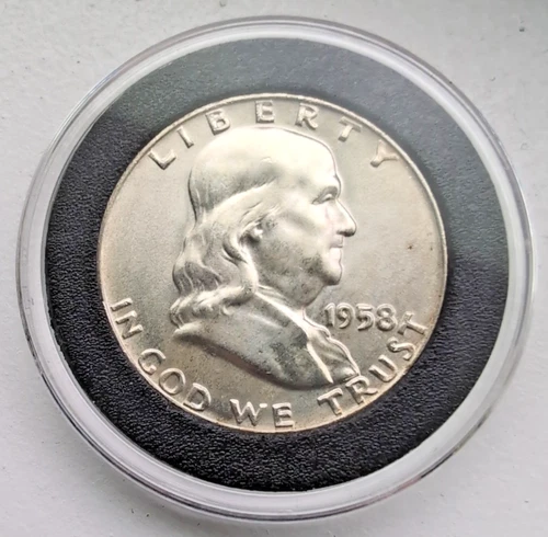 1958 Franklin Silver Half Dollar uncirculated in Airtight holder