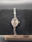 Vintage Timex Women's Silver Tone Quartz Watch Speidel Stretch Band Small Dress