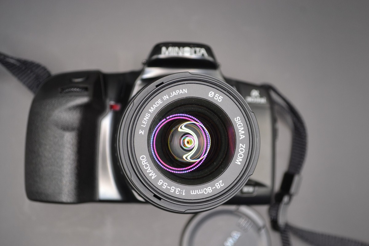 MINOLTA α 303si + Sigma Lenses 28-80mm & 70-300mm + Bag