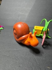 Strawberry Shortcake berry bike/tricycle and Garden Snail