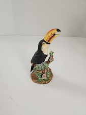 Royal Crown Ceramic Toucan Parrot Sitting on A Branch with Berry in Mouth 