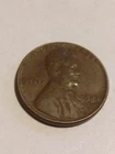 1954 wheat penny no mint mark L On Rim Error