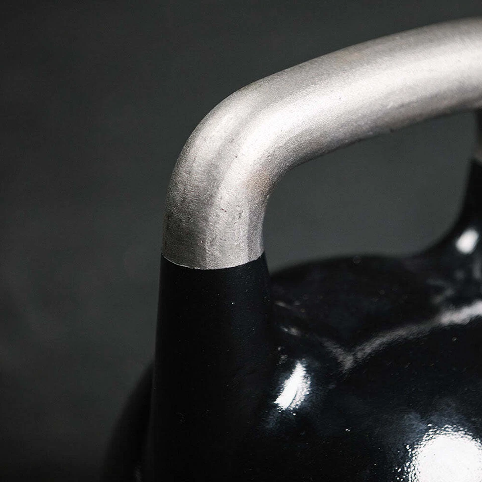 Kettlebell de competición ajustable Titan Fitness, 12-32 KG, agarre ergonómico suave Foto 3 de 4