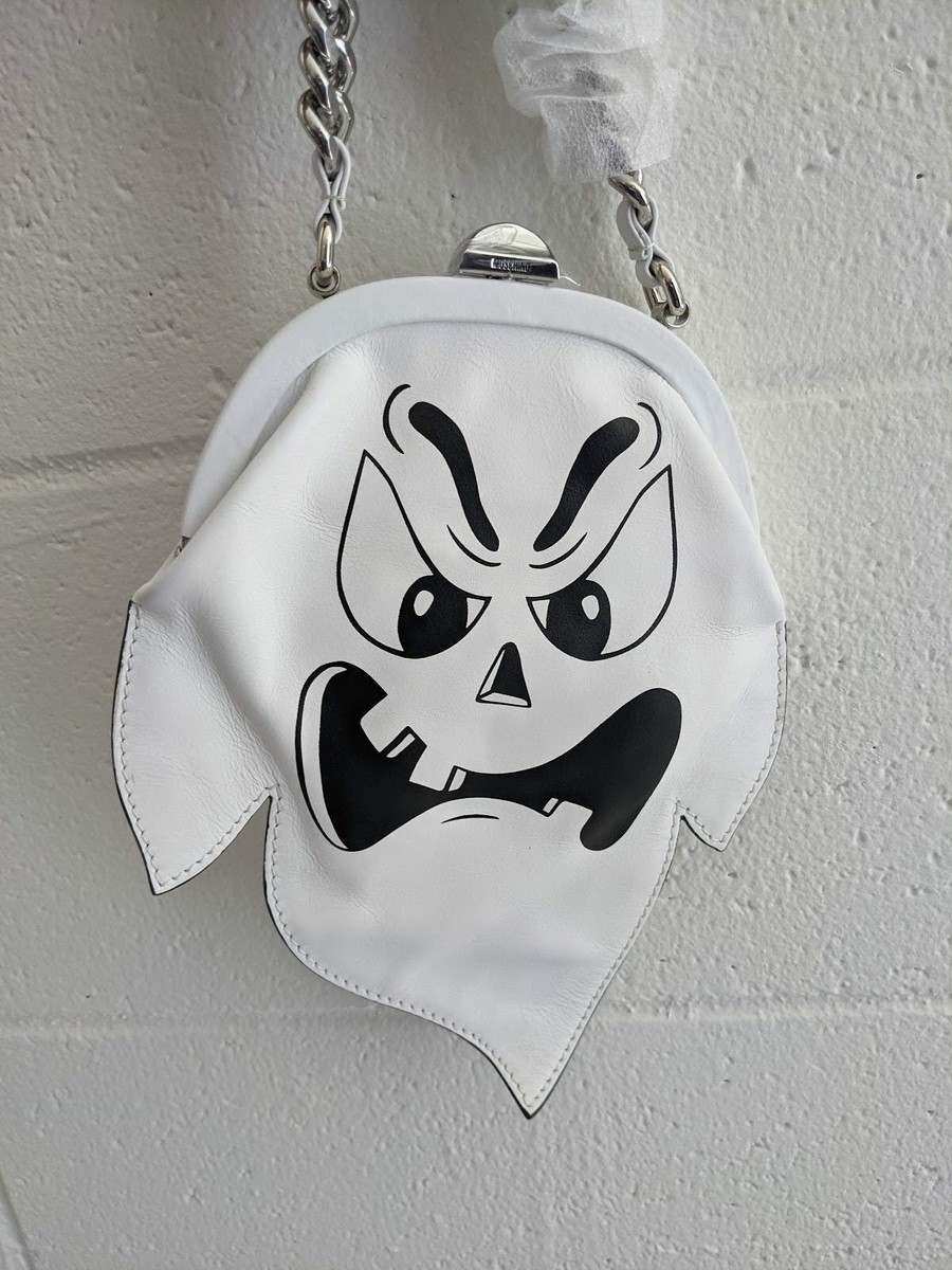 white moschino clutch bag