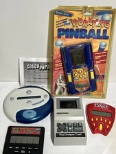 Electronic Handheld Game Lot - Oregon Trail - Pinball - Poker - Catch Phrase