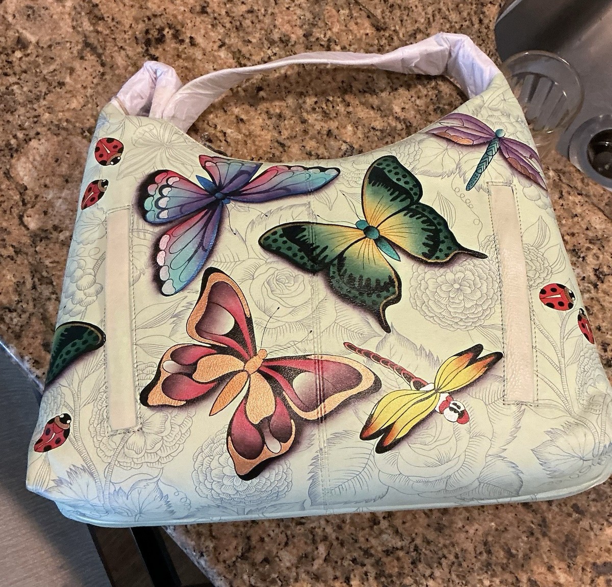 Anuschka Butterfly and ladybug convertible slim hobo w/crossbody