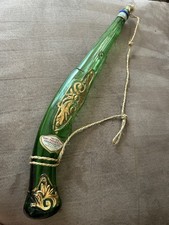 Pistola in vetro verde