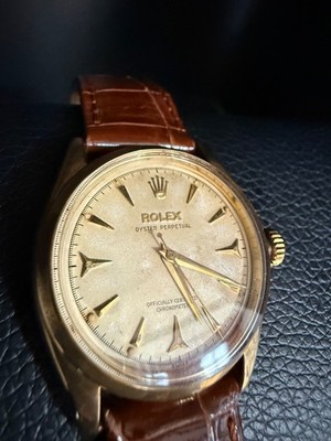 Rolex Oyster Perpetual 14k yellow gold White patina dial Shark teeth 369 markers