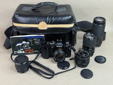Konica FS-1 35mm Film Camera set w/ 4 lenses 28mm ,50mm ,35-105 ,80-200 More