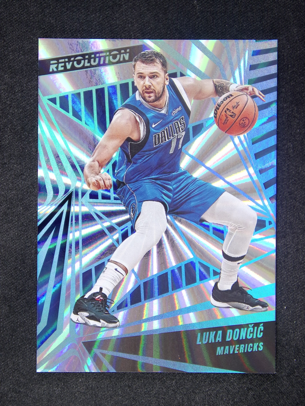 2023-24 Panini Revolution Luka Doncic #83 Sunburst /75